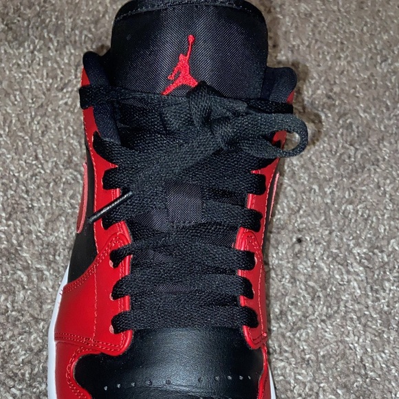 Air jordan 1s low tops red,black and white / size 9.5